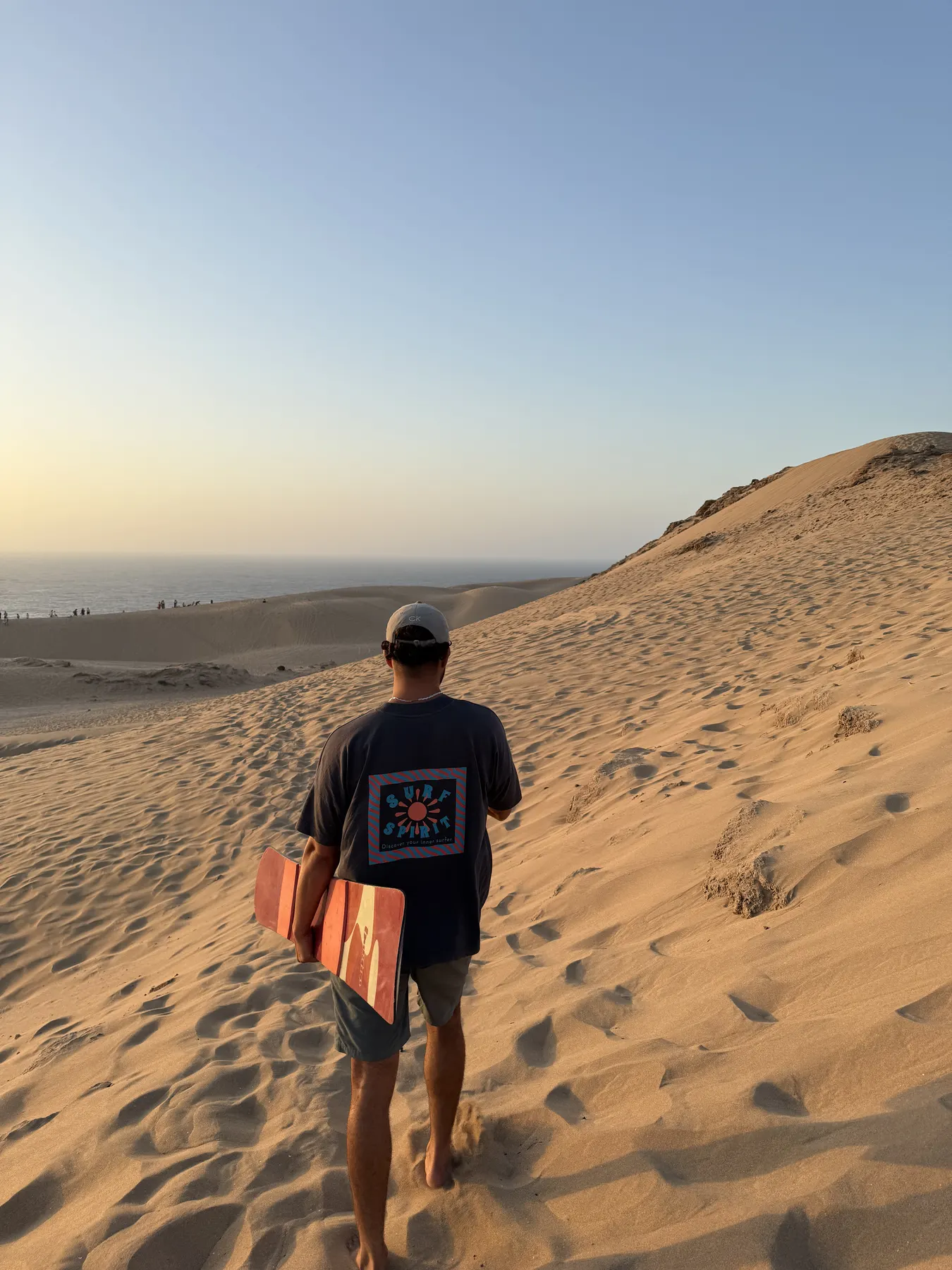 Sandboarding on the dunes near Tamraght